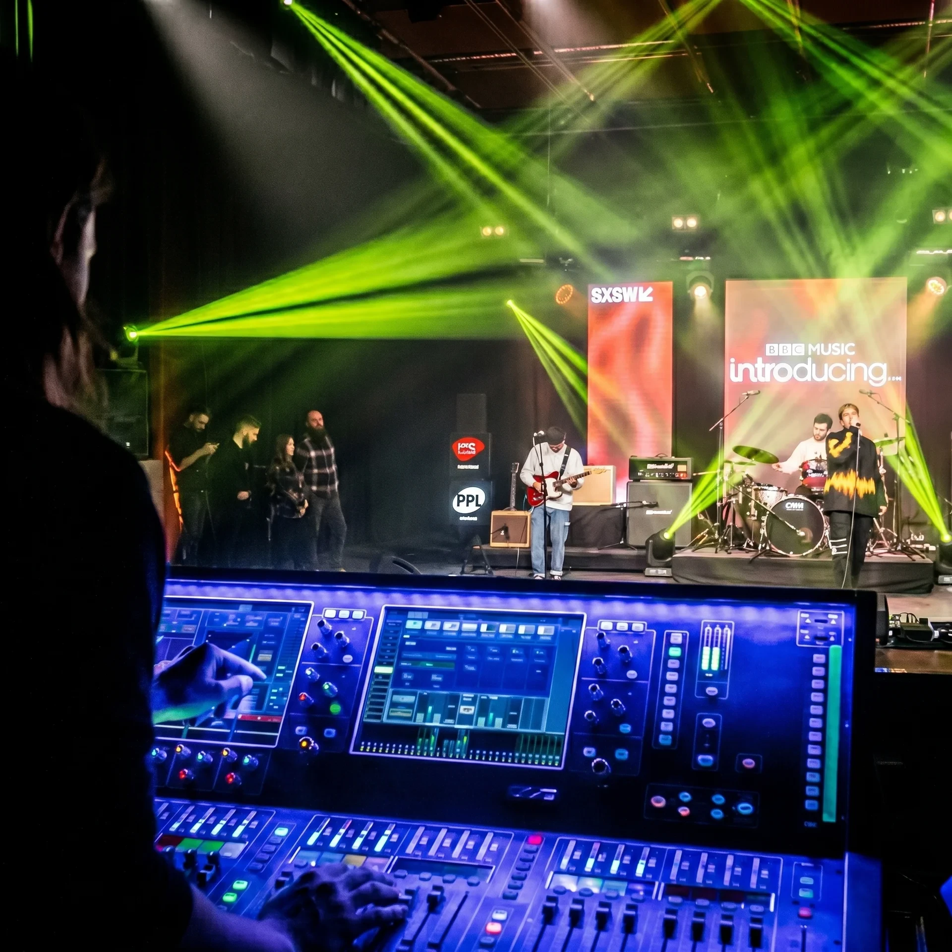 Sound engineer mixing a live concert